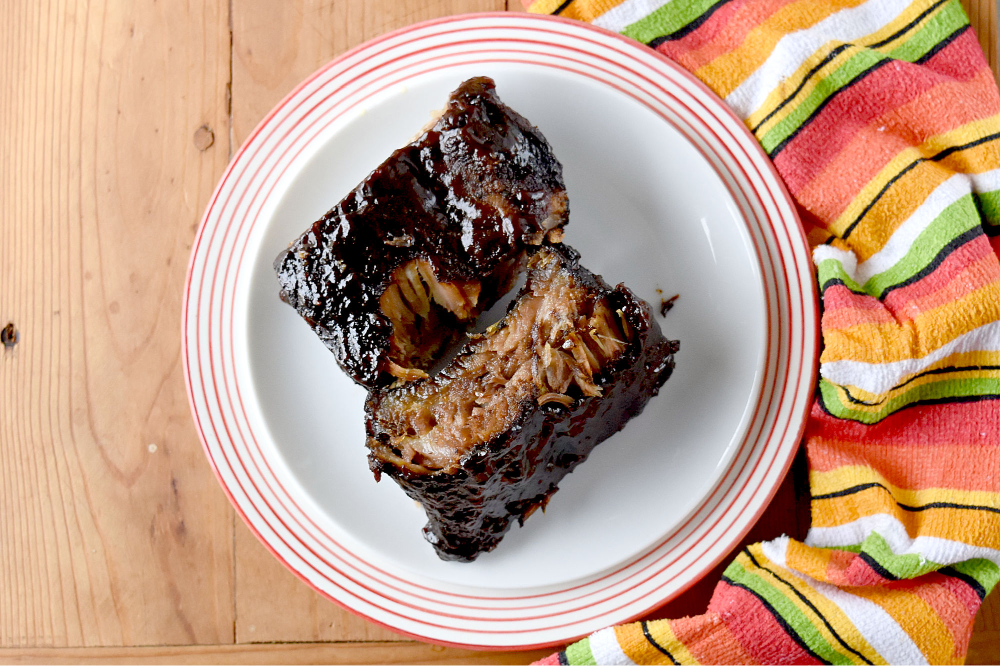 Easy Smoked Ribs are tender, delicious, and mostly hands off.  Even if you don't have a smoker you can still have delicious ribs for your barbecue. #BBQWeek