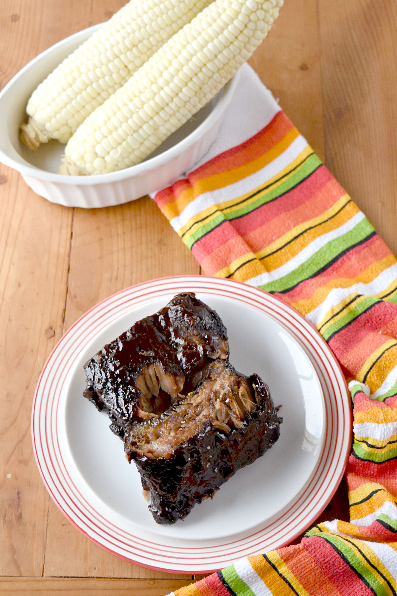 Easy Smoked Ribs are tender, delicious, and mostly hands off. Even if you don't have a smoker you can still have delicious ribs for your barbecue. #BBQWeek