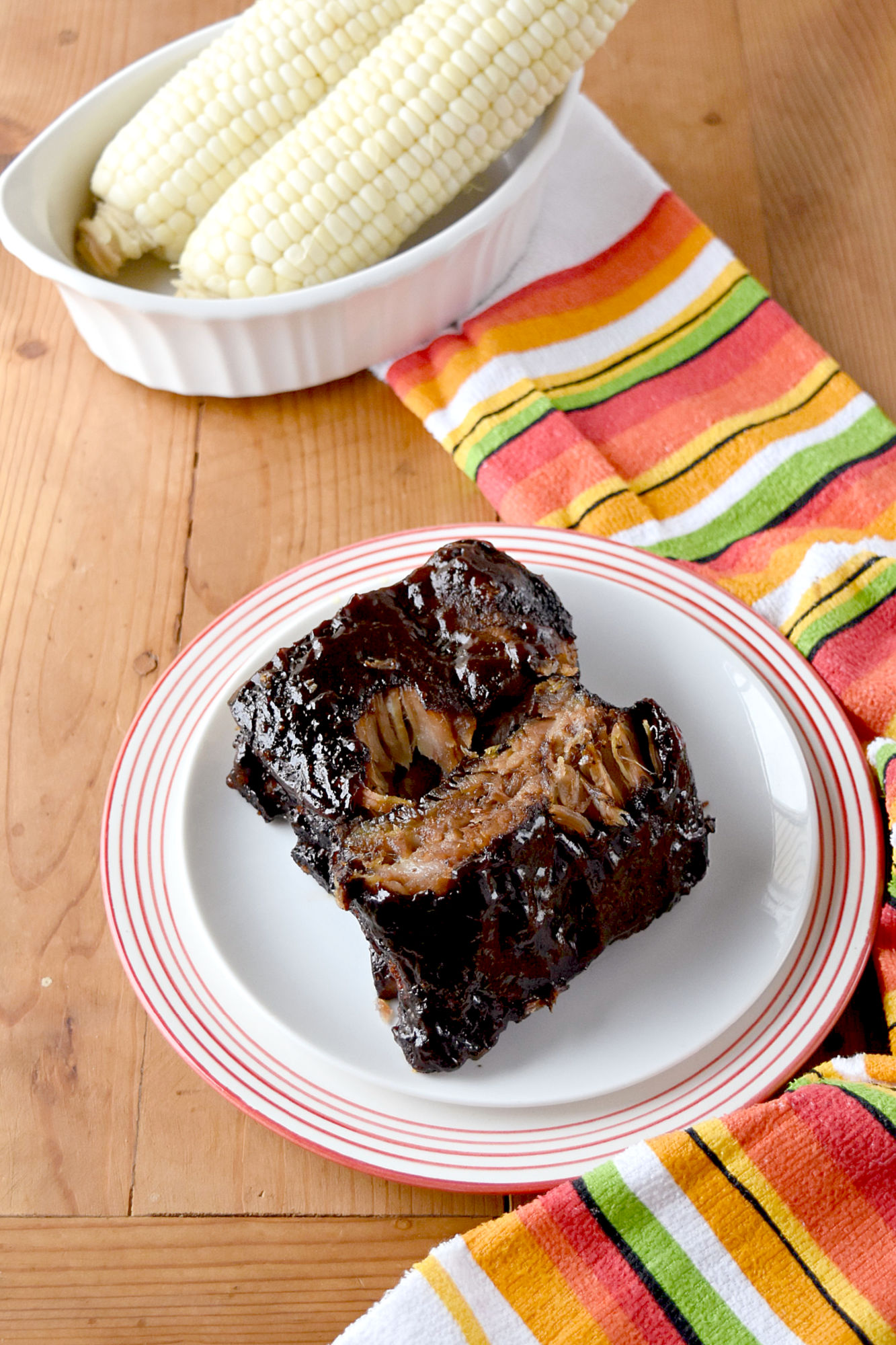 Easy Smoked Ribs are tender, delicious, and mostly hands off. Even if you don't have a smoker you can still have delicious ribs for your barbecue. #BBQWeek