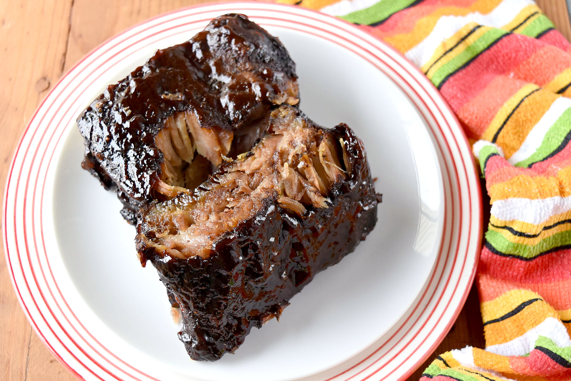 Easy Smoked Ribs are tender, delicious, and mostly hands off. Even if you don't have a smoker you can still have delicious ribs for your barbecue. #BBQWeek