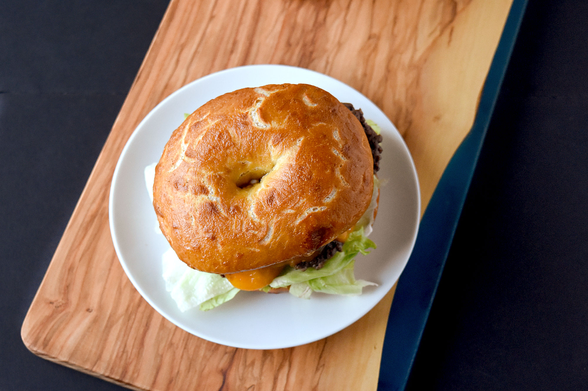 Bagel Buns are deliciously simple to make for any backward grilling party. They stand up to the any burger and taste delicious. #OurFamilyTable