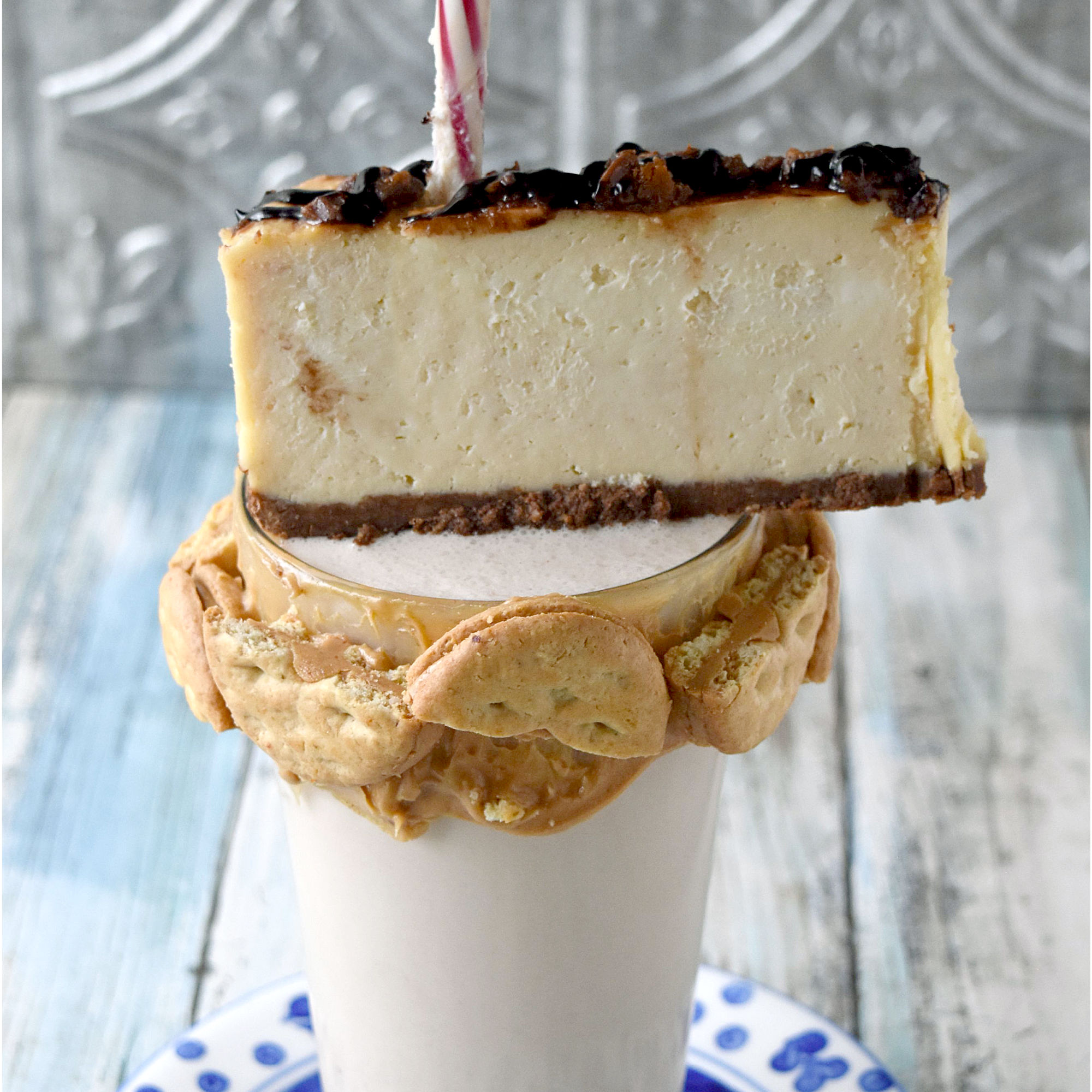 Peanut Butter Cheesecake Milkshakes tastes like a peanut butter cheesecake in a glass. It is sweet, full of peanut butter flavor with a hint of cheesecake tang. #OurFamilyTable