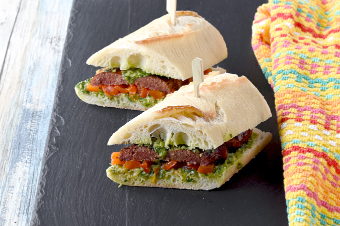 Grilled Choripán with Chimichurri is made with chorizo and delicious bread.  The chimicurri is spread onto the bread so it will soak up all that delicious flavor. #FarmersMarketWeek
