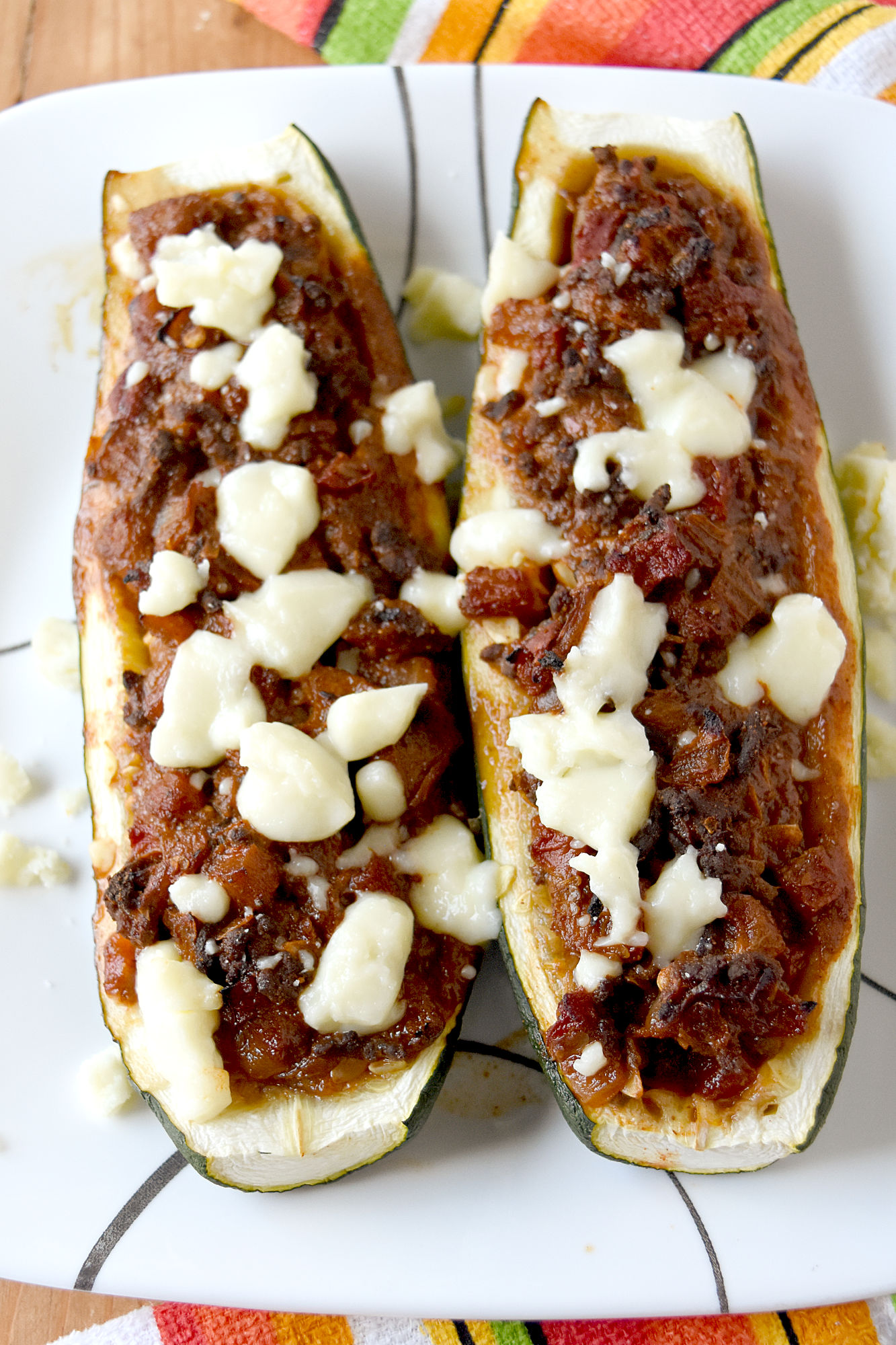 Taco Stuffed Zucchini Boats have tons of flavor and perfectly fun to eat. Your kids will focus on the boats and not the zucchini. #FarmersMarketWeek
