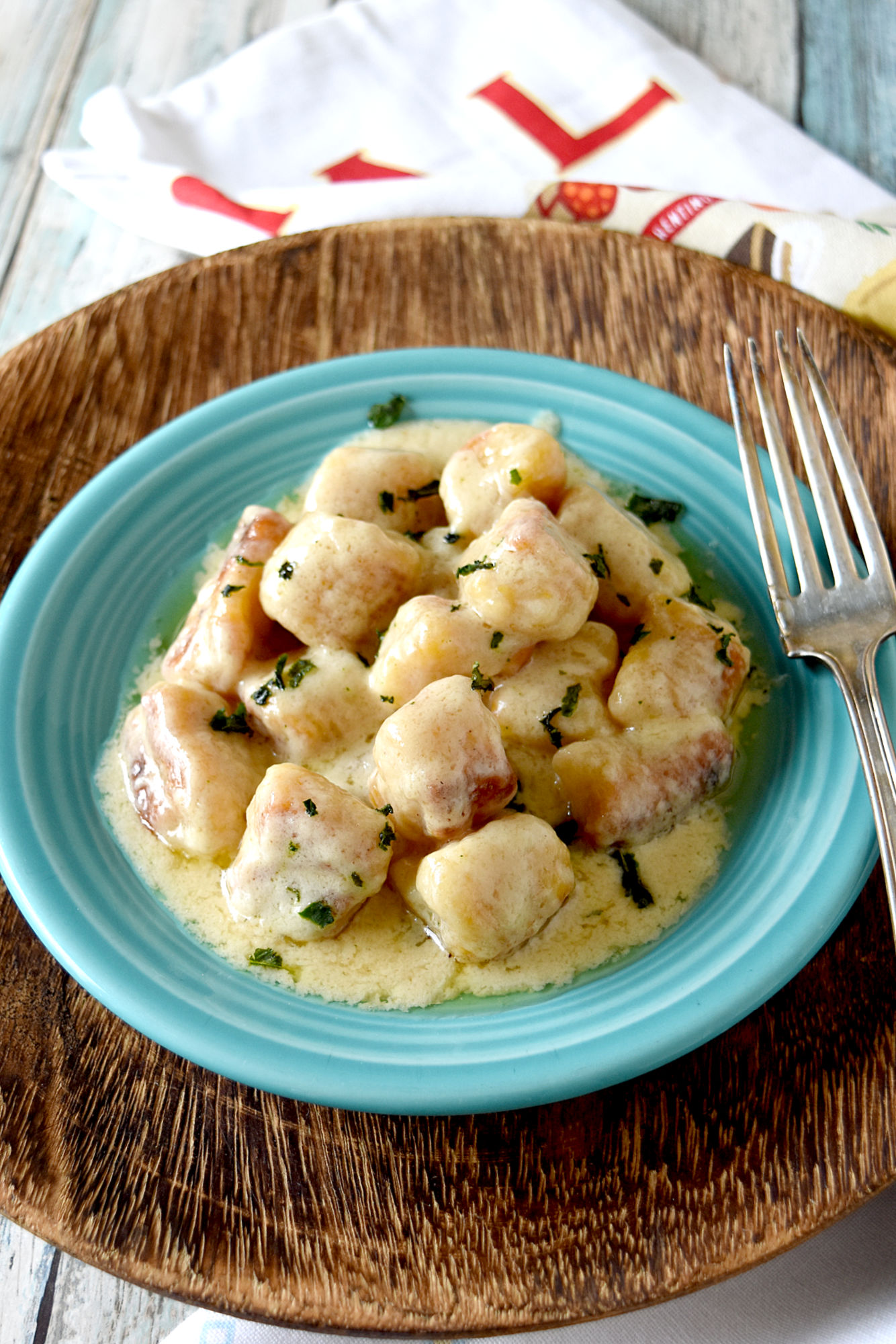 Butternut Squash Gnocchi are simple to make and has a rich flavor from the ricotta and butternut squash.  The flecks of orange throughout the gnocchi make these perfect for a fall dinner. #FallFlavors