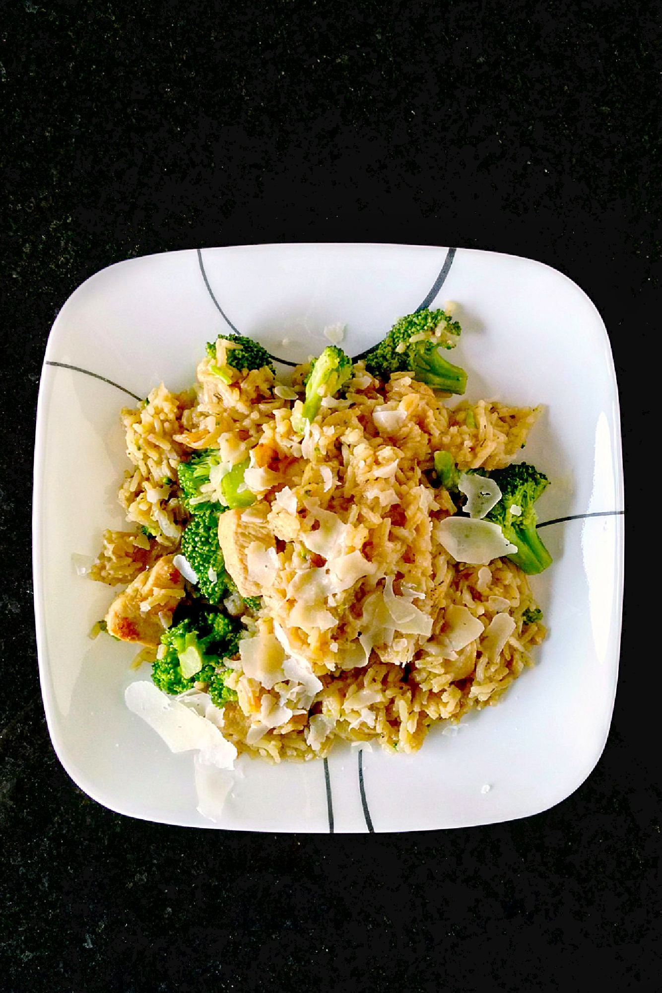 A delicious one skillet meal, this Cheesy Broccoli Chicken and Rice is hearty and full of flavor. Your picky eaters won't mind eating broccoli in this dish! #OurFamilyTable