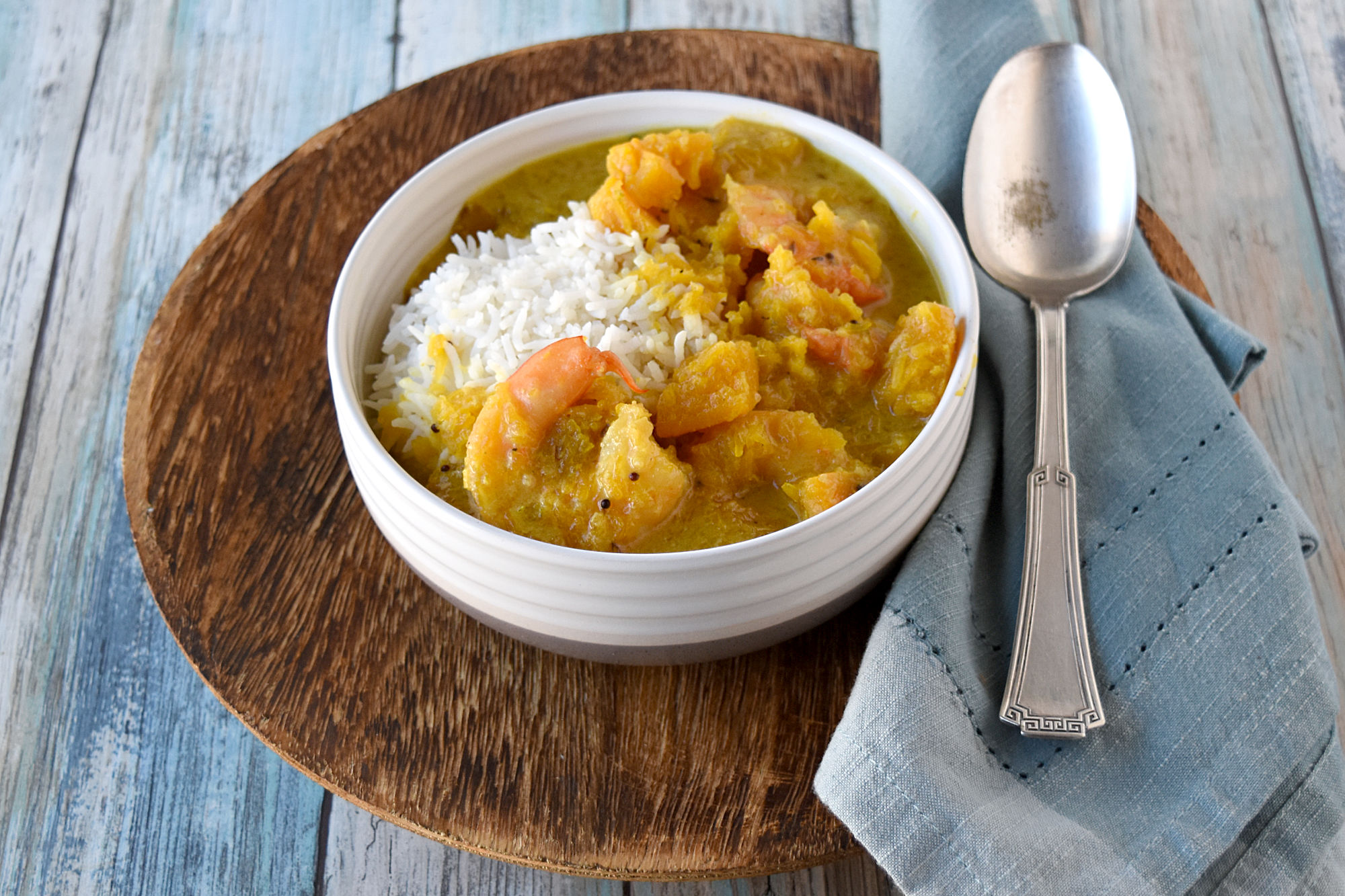 Coconut Pumpkin Shrimp Curry is packed with delicious curry flavors, sweet pumpkin, tasty shrimp, and a kick from the homemade chili base.  It is creamy with yummy kick. #PumpkinWeek