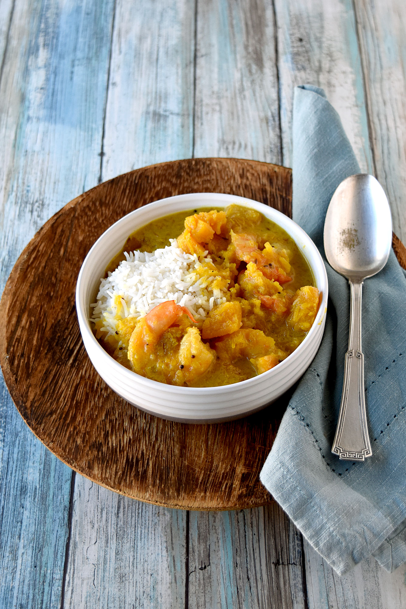 Coconut Pumpkin Shrimp Curry is packed with delicious curry flavors, sweet pumpkin, tasty shrimp, and a kick from the homemade chili base.  It is creamy with yummy kick. #PumpkinWeek