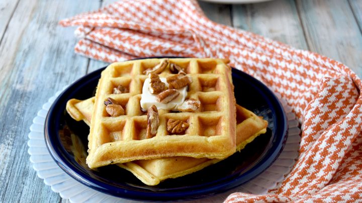 Overnight Pumpkin Waffles are light, fluffy, and irresistible.  Your family will love them and ask for them all the time.  You will love how easy they are to make. #PumpkinWeek