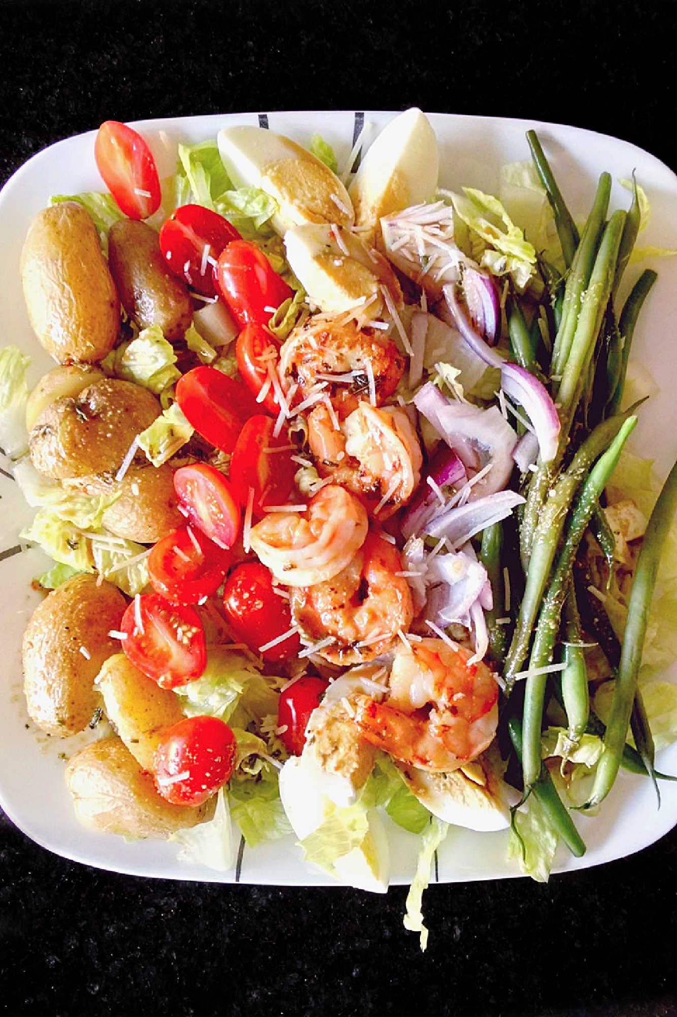 Add a fresh twist to your salad game with this delicious Grilled Shrimp Salad Niçoise! Quick and easy to make, perfect for a healthy lunch or dinner. #grilledshrimp #saladnicoise #seafoodlovers #summergrilling #healthyeats #salad #nicoise #GrilledShrimpSalad #HealthyEating #SummerSalads #NicoiseSalad #SeafoodLovers