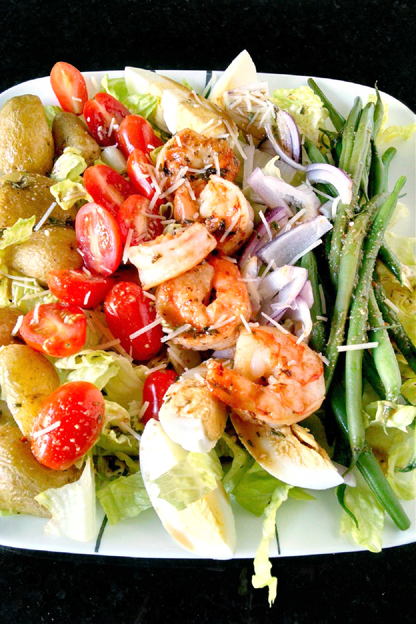 Add a fresh twist to your salad game with this delicious Grilled Shrimp Salad Niçoise! Quick and easy to make, perfect for a healthy lunch or dinner. #grilledshrimp #saladnicoise #seafoodlovers #summergrilling #healthyeats #salad #nicoise #GrilledShrimpSalad #HealthyEating #SummerSalads #NicoiseSalad #SeafoodLovers