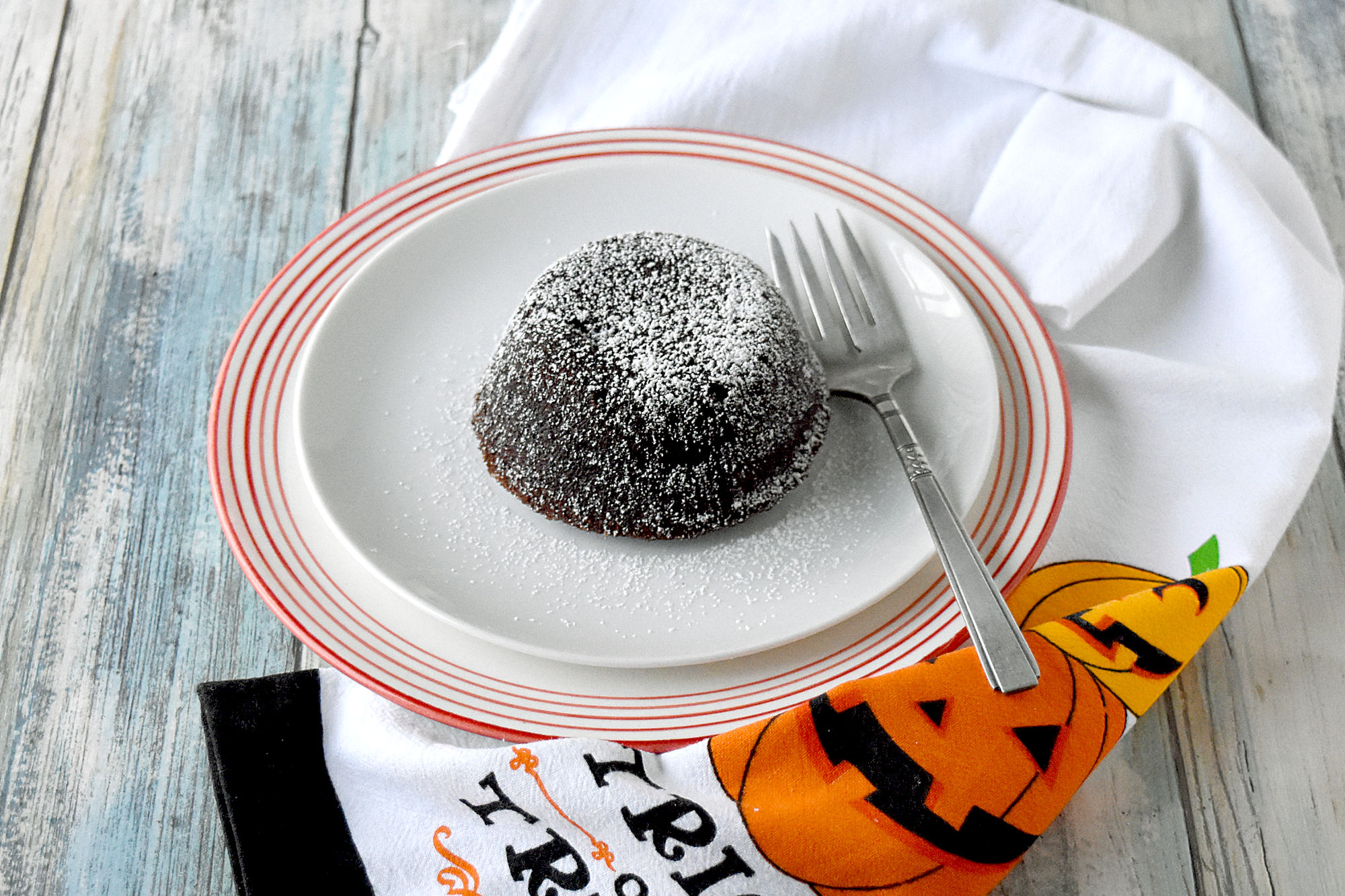 Oozing Red Velvet Cake is rich and delicious with an oozing center.  Serve with a strawberry sauce for more oozing fun! #HalloweenTreatsWeek