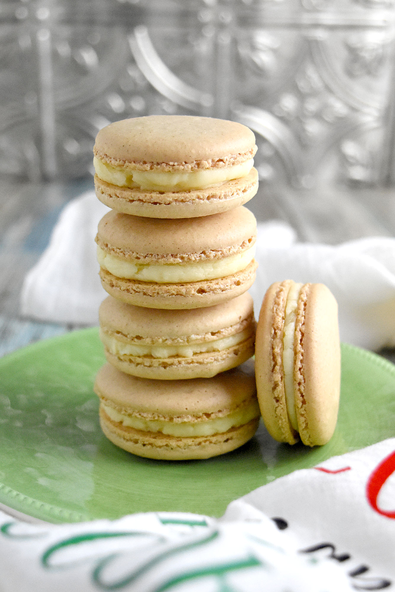 Cinnamon Toast Macaron have melba toast and cinnamon in the shells and filled with butter flavored buttercream. It’s the ultimate in cinnamon toast flavor. #ChristmasCookiesWeek
