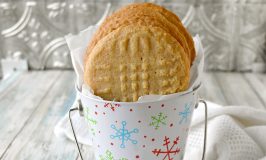 Easy Peanut Butter Cookies come together in minutes with simple pantry ingredients. They are chewy and crispy with delicious peanut butter flavor. #ChristmasCookies