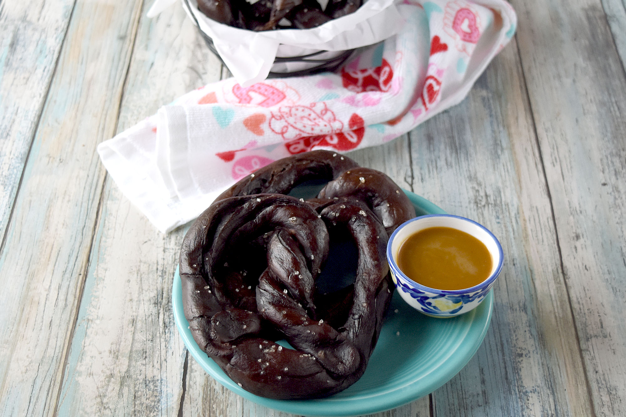 Easy Soft Chocolate Pretzels are chewy and delicious with the aroma and flavor of chocolate.  These are savory pretzels and taste delicious with a buckwheat honey mustard dipping sauce. #ChocolateWeek 