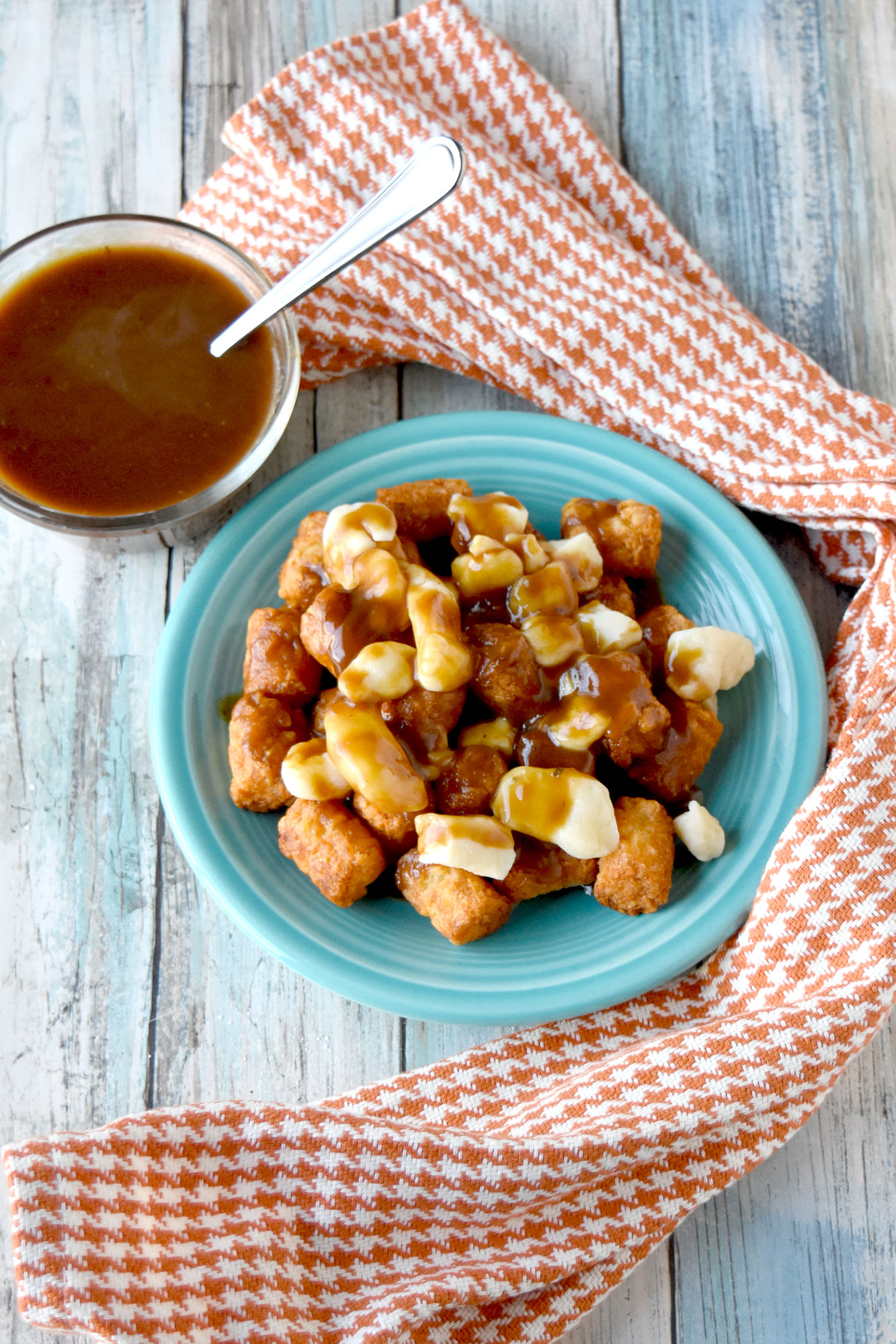 Crispy tater tots, cheese curds, and Espagnole sauce is a rich and delicious.