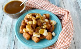 Swimming in Espagnole sauce, Espagnole Tater Tot Poutine tastes perfectly delicious.