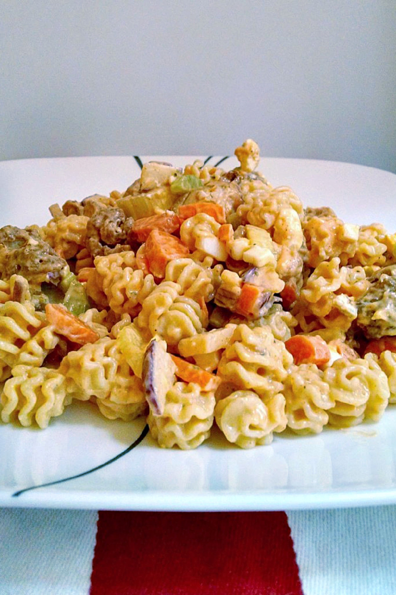 Buffalo Chicken Pasta Salad uses leftover boneless buffalo chicken wings to make a deliciously quick and spicy weeknight dinner, but you could use any boneless and skinless chicken you have available. #BuffaloChickenPastaSalad #PastaSaladPerfection #SpicySaladSensation #SummerEats #EasyPastaRecipes #pastasalad #rotisseriechicken #Buffalochicken #TailgateFavorites #SpicyPastaSalad #PastaSaladObsessed