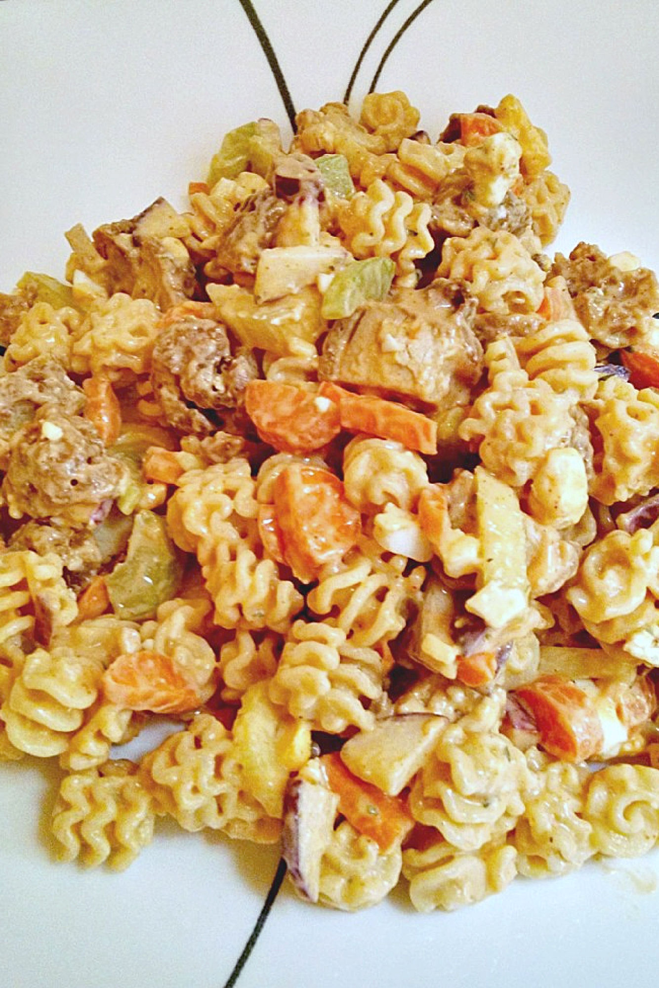 Buffalo Chicken Pasta Salad uses leftover buffalo chicken rotisserie chicken to make a deliciously quick and spicy weeknight dinner, but you could use any boneless and skinless chicken you have available.  #OurFamilyTable