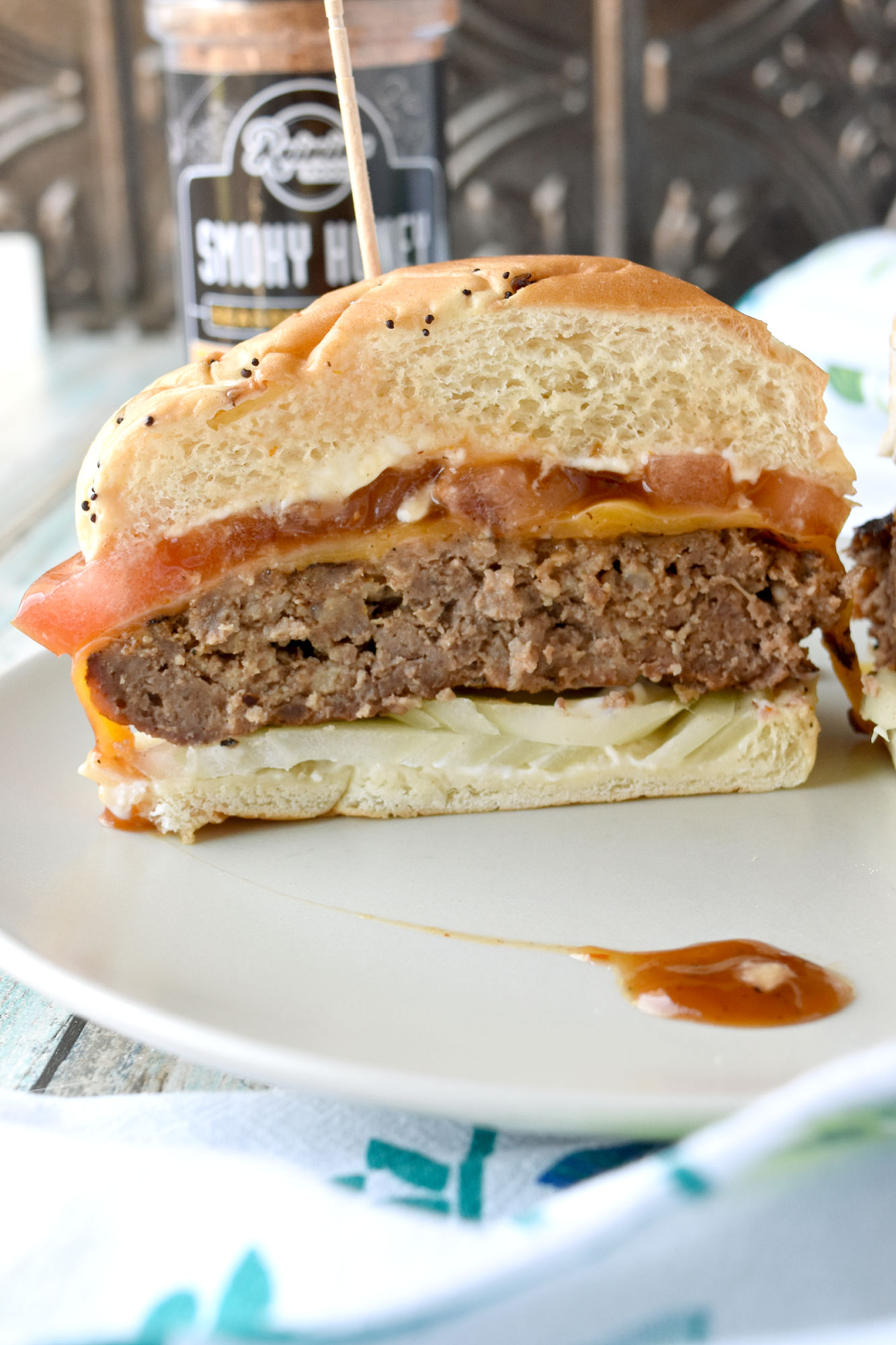 Barbecued Pork Burgers not only have barbecue sauce, but also a Smoky Honey seasoning bland that makes them smoky and sweet.  #BBQWeek
