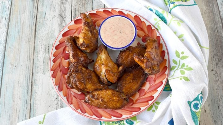 Sweet and Spicy Smoked Wings are so easy and so worth the time it takes to make them. The smoky flavor combined with the spicy marinade and delicious spices make for irresistible wings. #BBQWeek