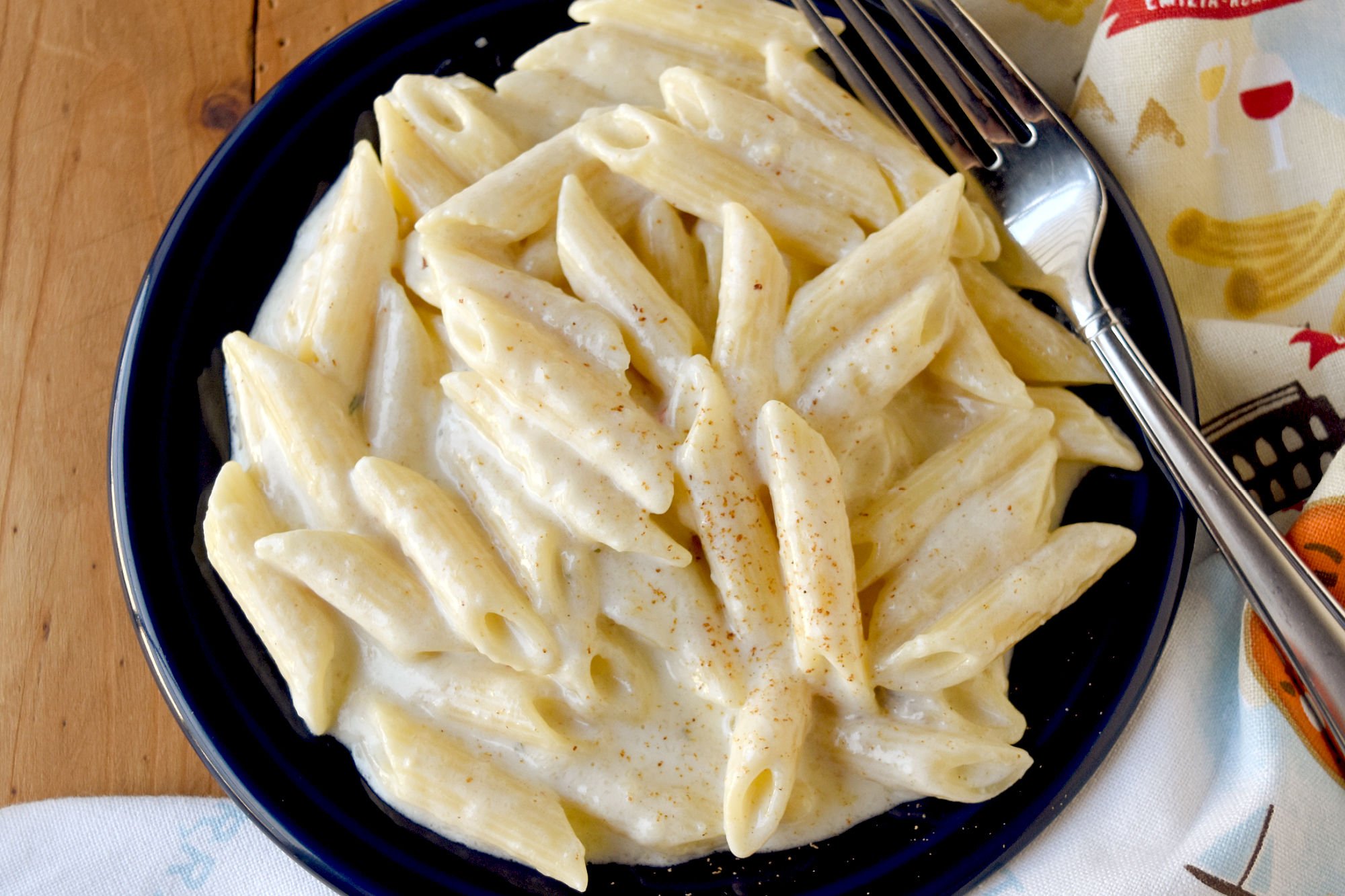 Easy Alfredo Sauce has 3 ingredients. It’s easier and simpler than you think to make a restaurant quality Alfredo sauce that is lick the plate delicious. #DairyMonth #Alfredo