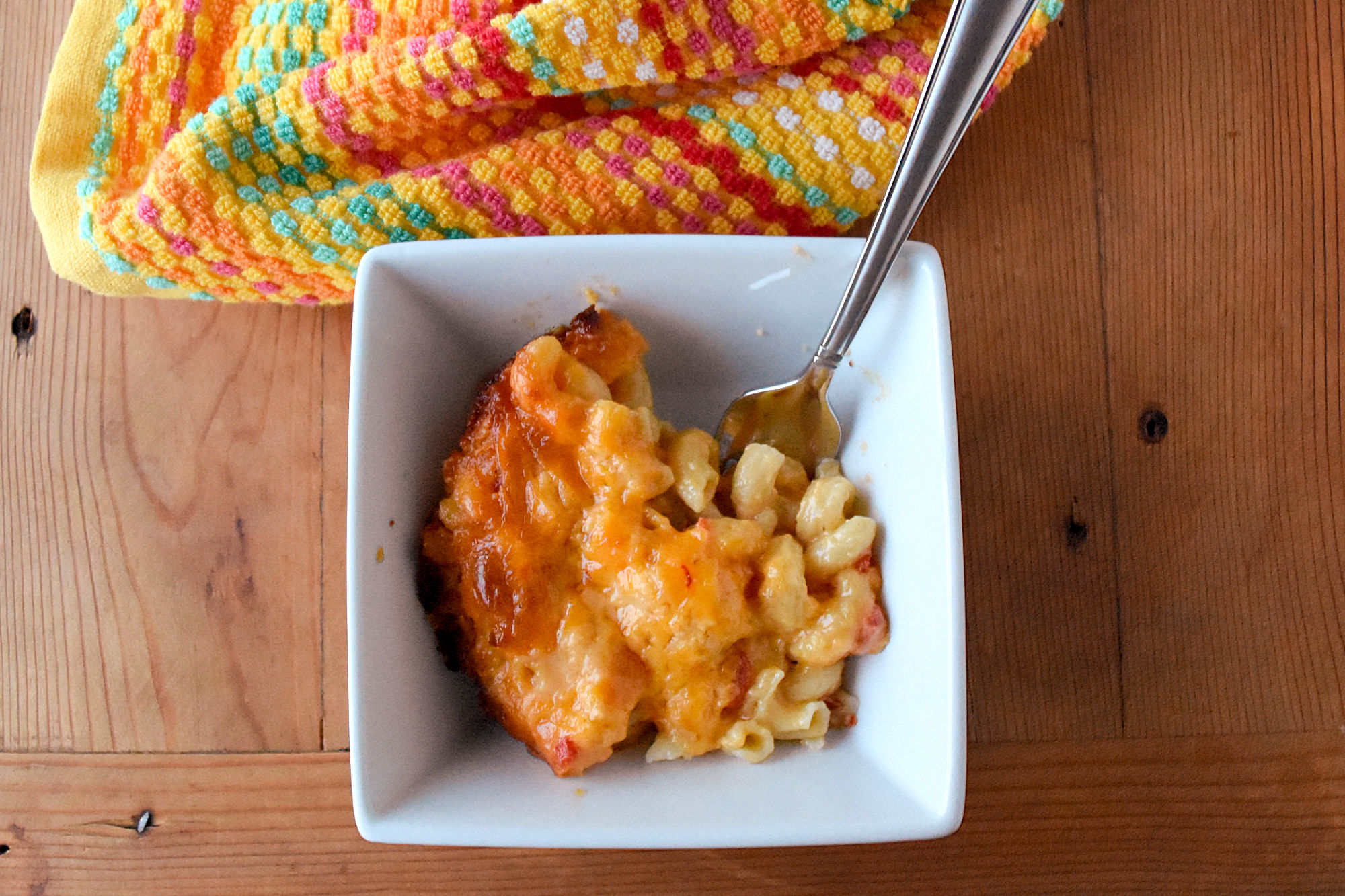 Pimento Cheese Mac and Cheese take a bechamel and adds the southern favorite cheese spread. It makes for a delicious macaroni and cheese with a creamy and salty kick. #NationalDairyMonth