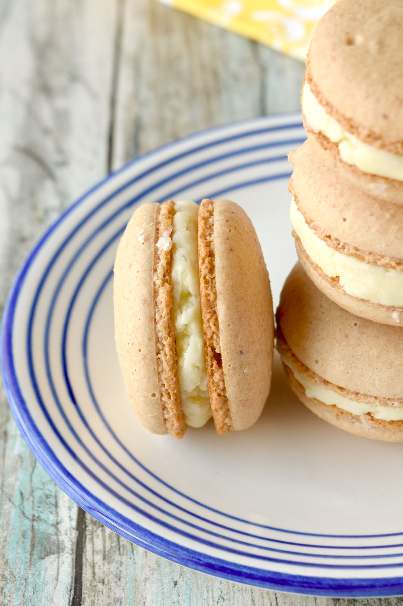 Strawberry Lemonade Macaron have the sweetness of strawberries in the shells and the tartness of lemons in the buttercream. They taste like the delicious summertime drink in a macaron. #BrunchWeek
