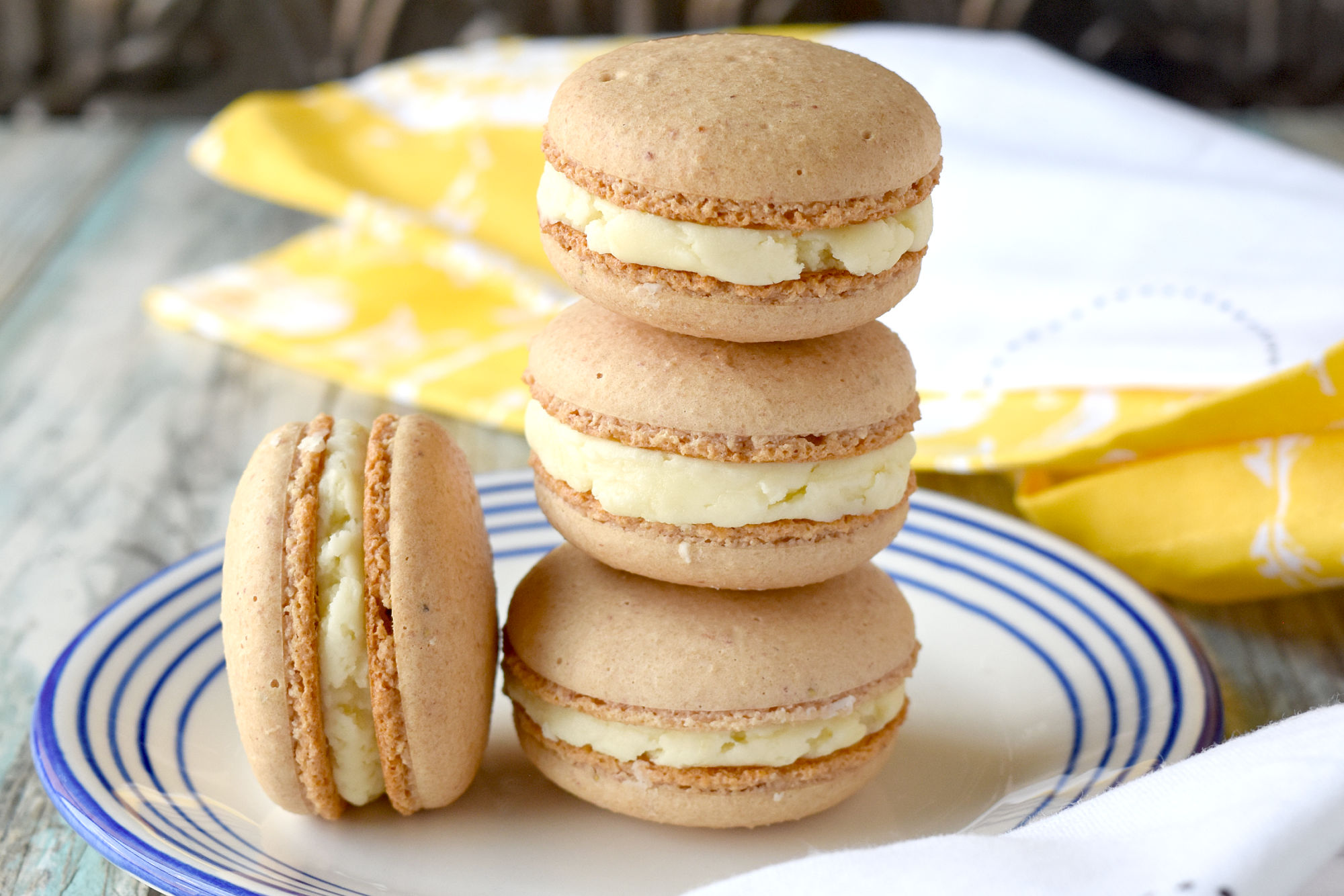 Strawberry Lemonade Macaron have the sweetness of strawberries in the shells and the tartness of lemons in the buttercream. They taste like the delicious summertime drink in a macaron. #BrunchWeek