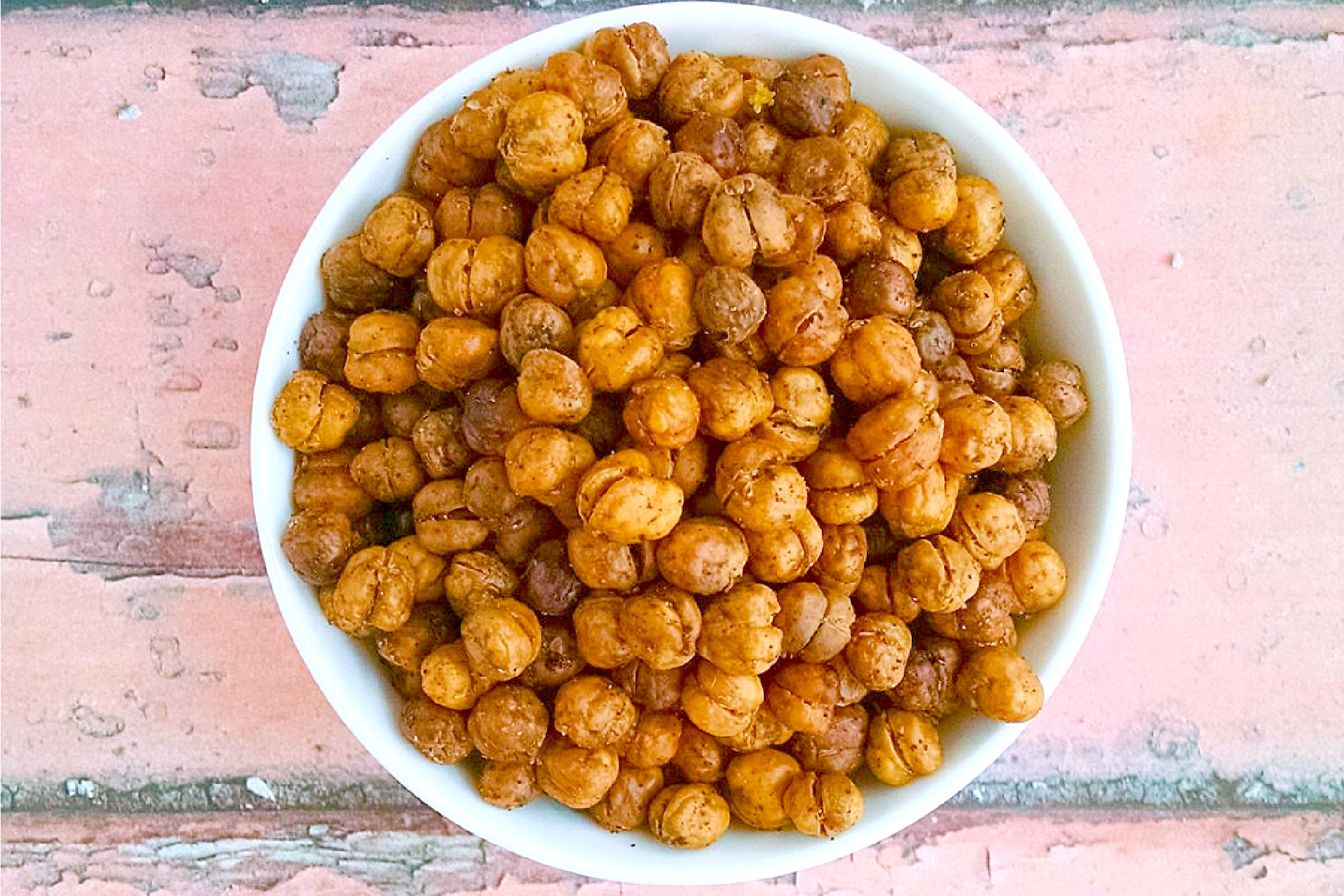 These roasted chickpeas are crunchy, tasty, and healthy! Pizza Roasted Chickpeas are tossed with savory pizza seasoning, Italian seasoning, and some garlic salt to give them that pizza parlor flavor.