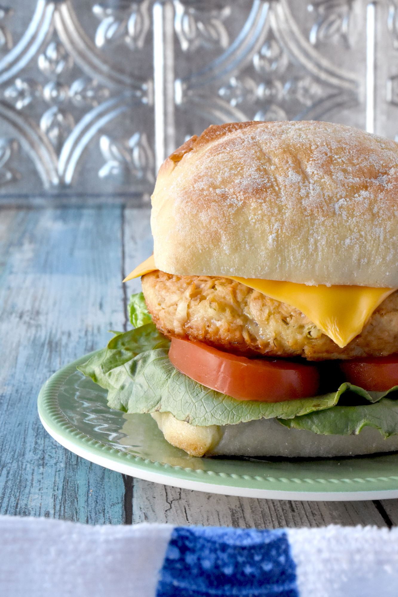 Southern Salmon Patty Sandwiches take delicious salmon patties and turns them into a fun sandwich for your family. It’s also a budget friendly meal for your family.  #OurFamilyTable #budgetfriendly #pantryrecipe #easyrecipe