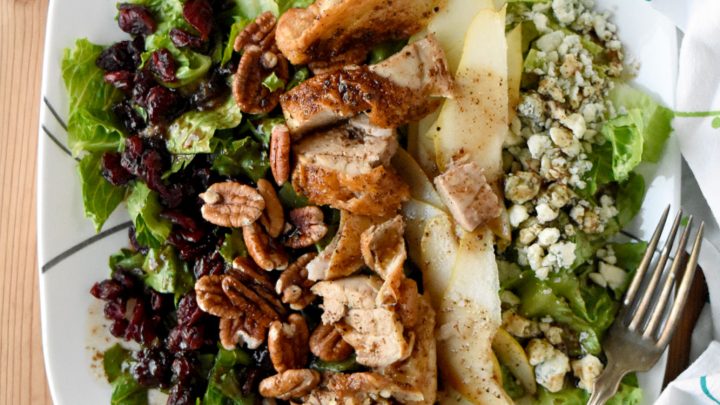 Autumn Cobb Salad has all the fall flavors. From sweet and crisp pears to crunchy pecans, and sweet tart dried cranberries. It’s a hearty and delicious fall cobb salad.  #FallFlavors #cobbsalad #pears #USAPears