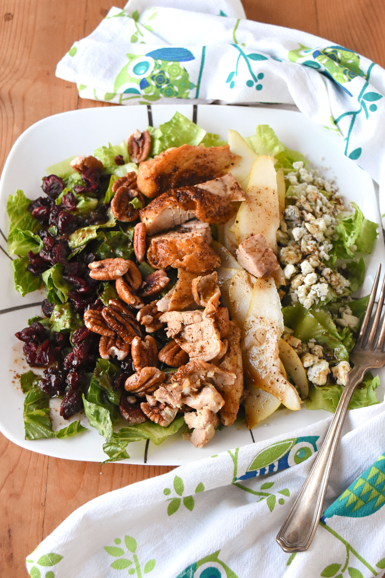 Autumn Chicken Cobb Salad has all the fall flavors. From sweet and crisp pears to crunchy pecans, and sweet tart dried cranberries. It’s a hearty and delicious fall cobb salad.  #FallFlavors #cobbsalad #pears #USAPears