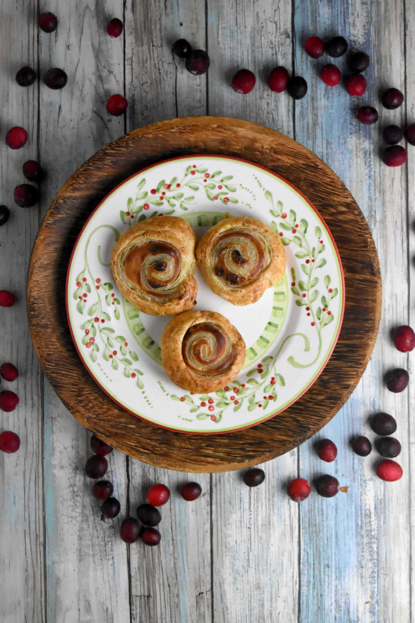Cranberry Cream Cheese Pinwheels are super simple to make but they taste oh so delicious.  With just a few ingredients, and some leftover cranberry sauce, you can have a fun and tasty appetizer. #CranberryWeek #cranberry #puffpastry #cranberrysauce #easyrecipe