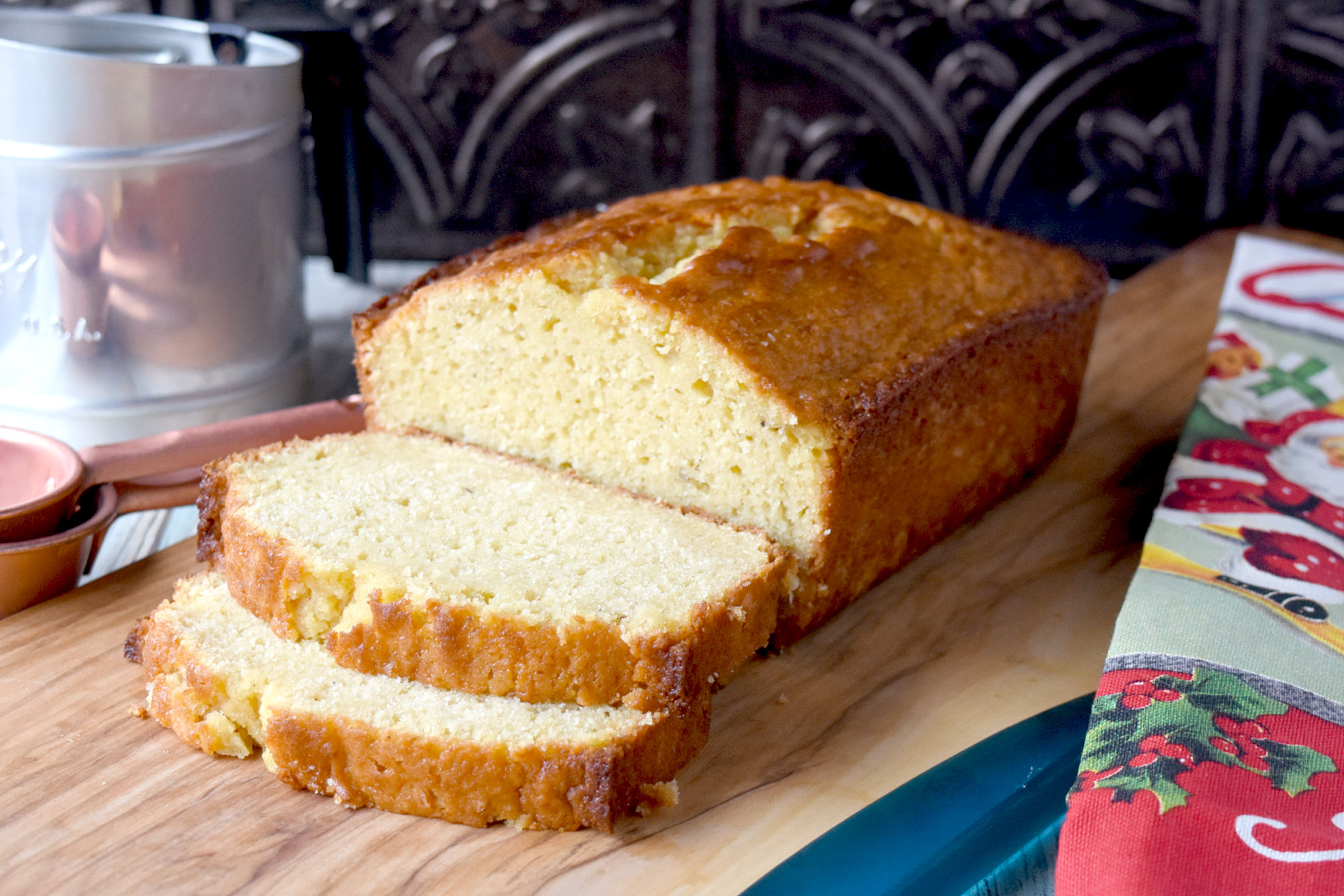 This Easy Eggnog Bread Recipe whips up in just a few minutes. It’s something you can throw together before everyone gets up then bake it while everyone trickles down to the kitchen. #ChristmasSweetsWeek #eggnog #quickbread #easyeggnogbread