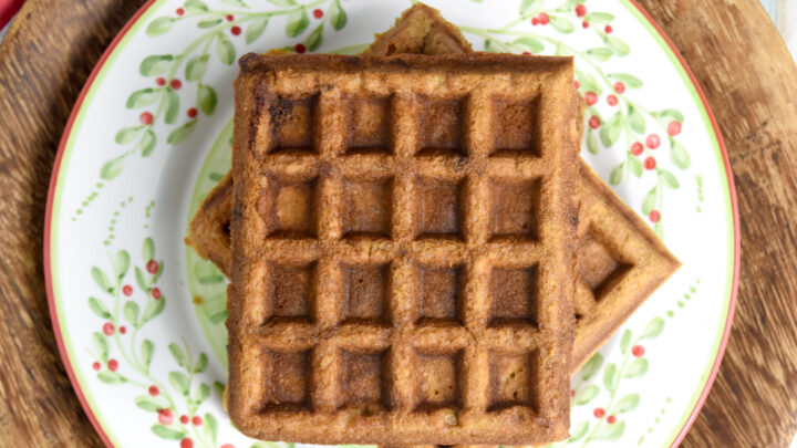 Gingerbread Waffles have all the gingerbread flavor in a delicious and easy waffle form. The spices are warming and delicious and the waffles whip up in minutes. Perfect for a holiday brunch. #ChristmasSweetsWeek #waffle #gingerbread #gingerbreadwaffles #easy #brunch