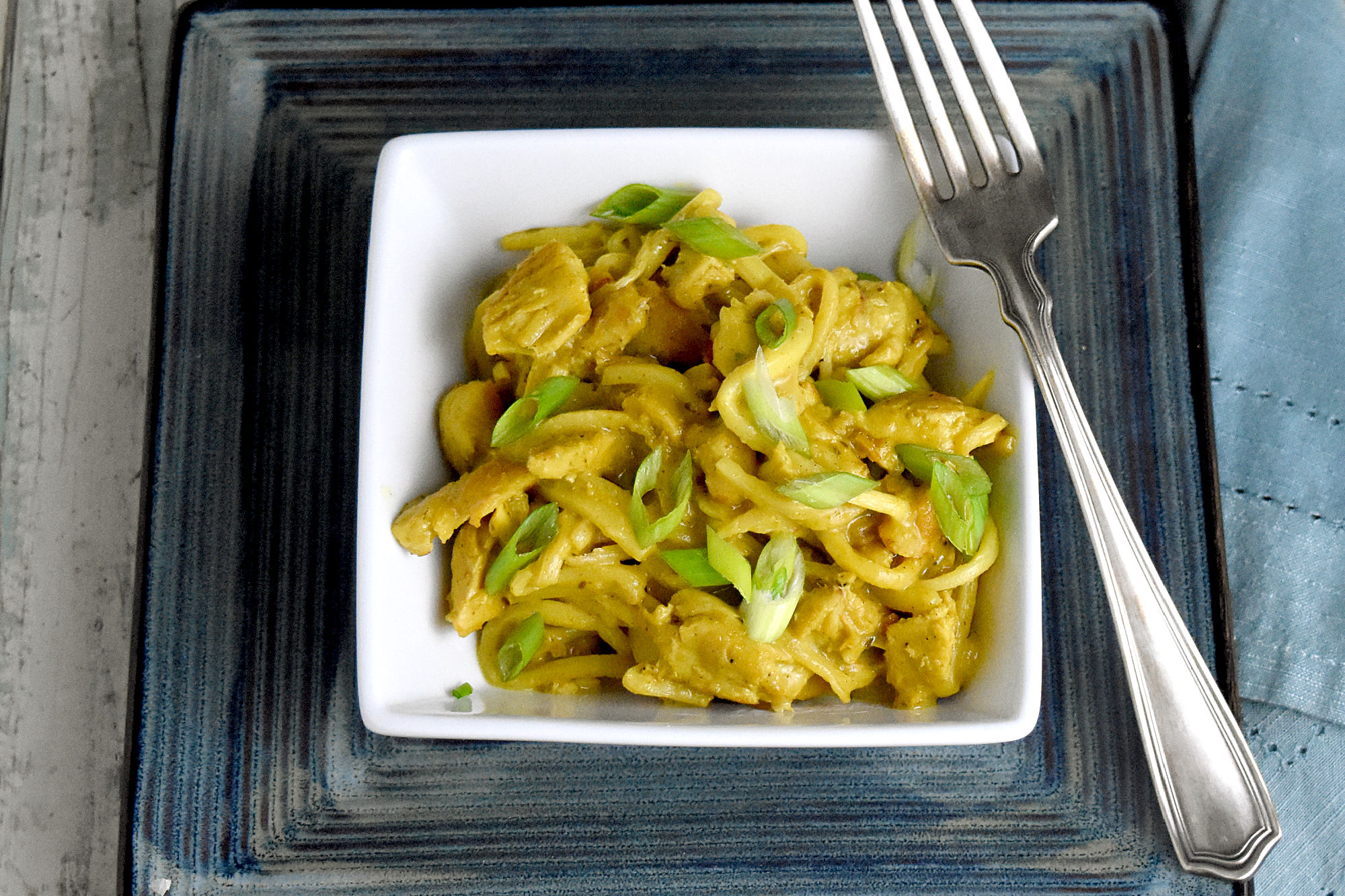 Thai Curry Chicken Pasta is rich, delicious, full of curry coconut richness.  This recipe not only tastes amazing, but is also keto, paleo, and gluten free! #kevinsrecipechallenge #glutenfree #paleo #keto #heartsofpalmnoodles