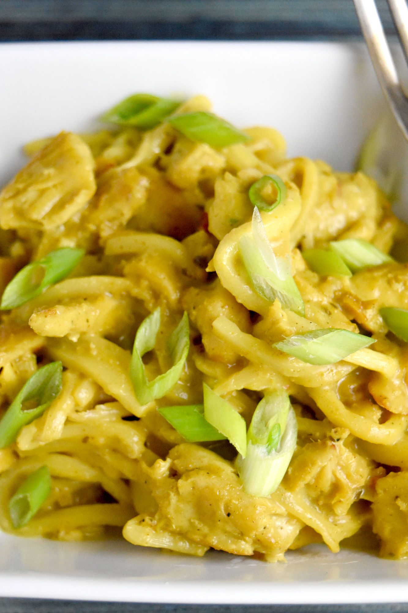 Thai Curry Chicken Pasta is rich, delicious, full of curry coconut richness.  This recipe not only tastes amazing, but is also keto, paleo, and gluten free! #kevinsrecipechallenge #glutenfree #paleo #keto #heartsofpalmnoodles