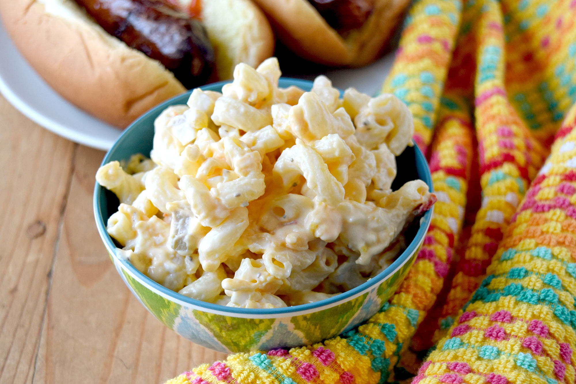 Pimento Cheese Macaroni Salad is a combination of a southern style macaroni salad with egg and pimento cheese spread. The two flavors together are deliciously creamy and cheesy. #OurFamilyTale #pimentocheese #macaronisalad #pimentosalad #sourthernfood #comfortfood