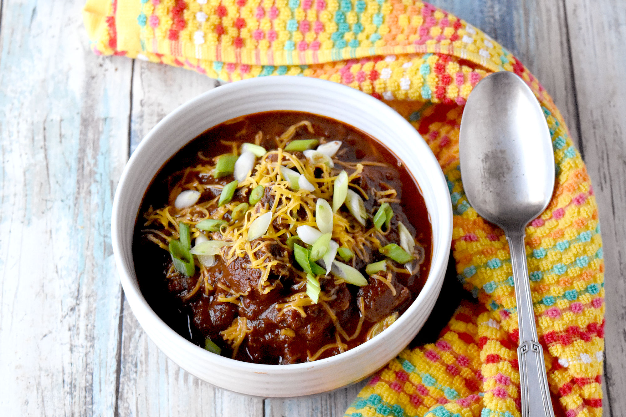 Texas Style Steak Chili is hearty, rich, and full of mild chile flavors. Four chile peppers are the base of this authentic style Texas chili your family will love! #TexasChili #nobeans #SelefinaSpices #homemade #chilibowl