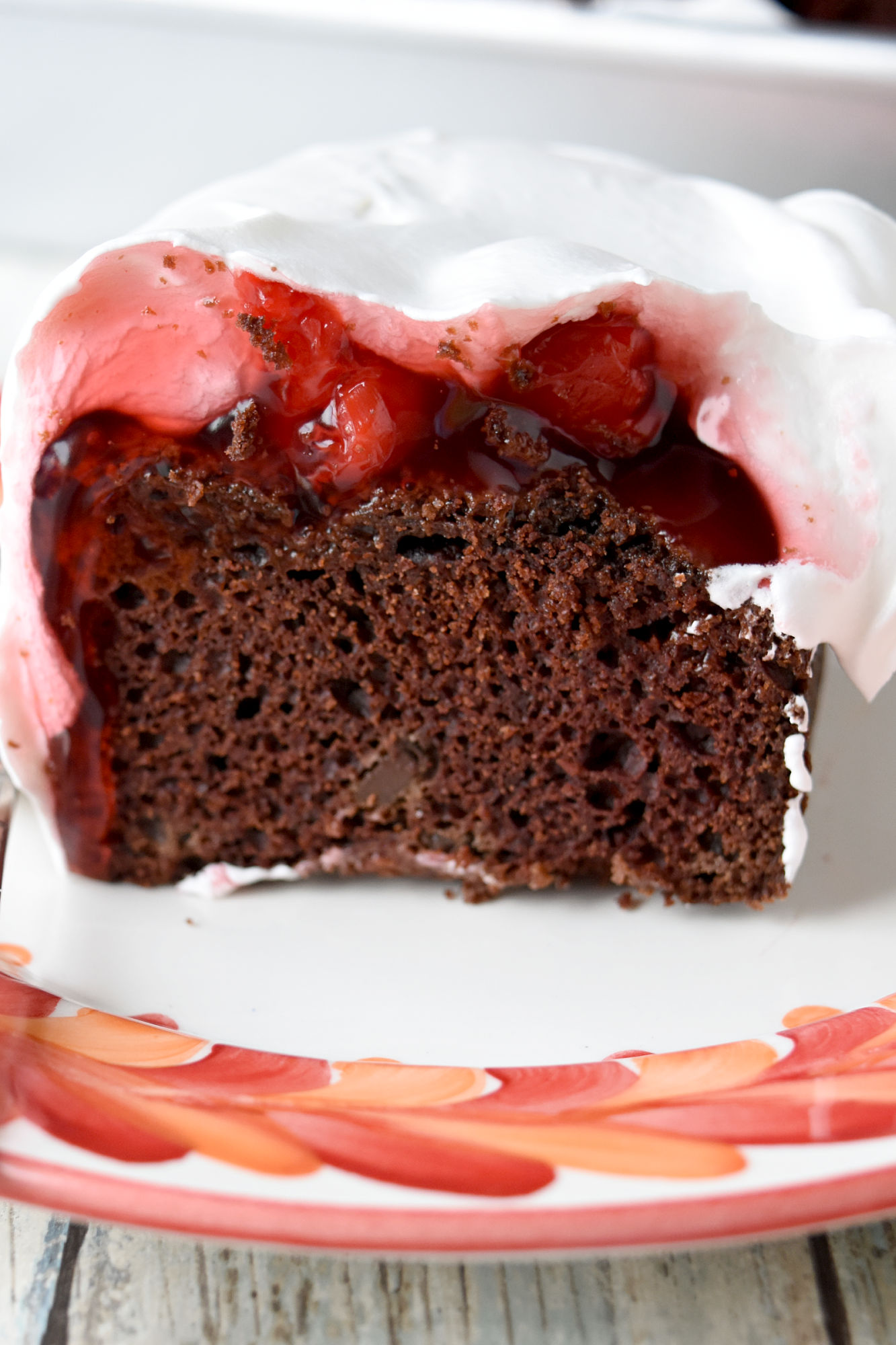 Black Forest Snack Cake has all the delicious chocolate and cherry flavors in an easy to make snack cake. The chocolate snack cake has cherry flavors inside the cake and has a cherry topping.  #ad #SpringSweetsWeek #Easter #BlackForestCake #easycake #cherrytopping