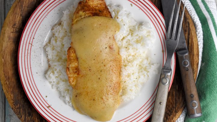Air Fryer Chicken with Cajun Velouté Sauce sounds fancy but it’s made with simple ingredients. Chicken, butter, flour, broth, and Cajun seasoning is all you need for this delicious dinner. #OurFamilyTable #Veloutesauce #Mothersauces #Cajun #airfryerchicken