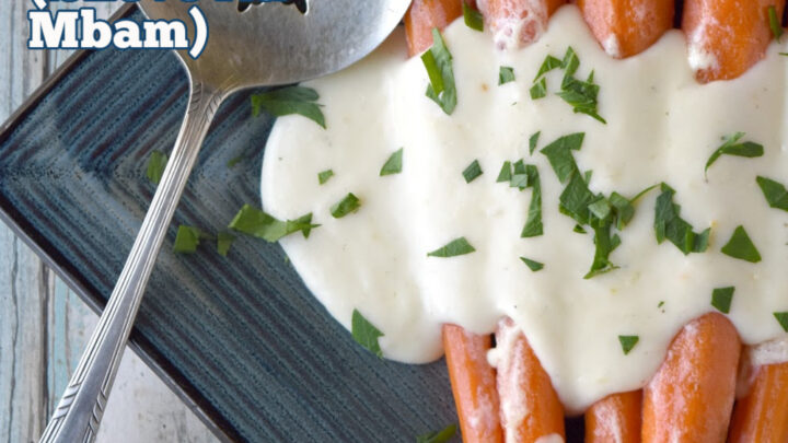 Irish Buttered Carrots, also called (Slieve Na Mbam) is a simple dish that tastes delicious. Simmered in milk and butter, they’re sweet, butter, and packed with flavor. #OurFamilyTable #easyrecipe #carrotrecipe #Irishrecipe