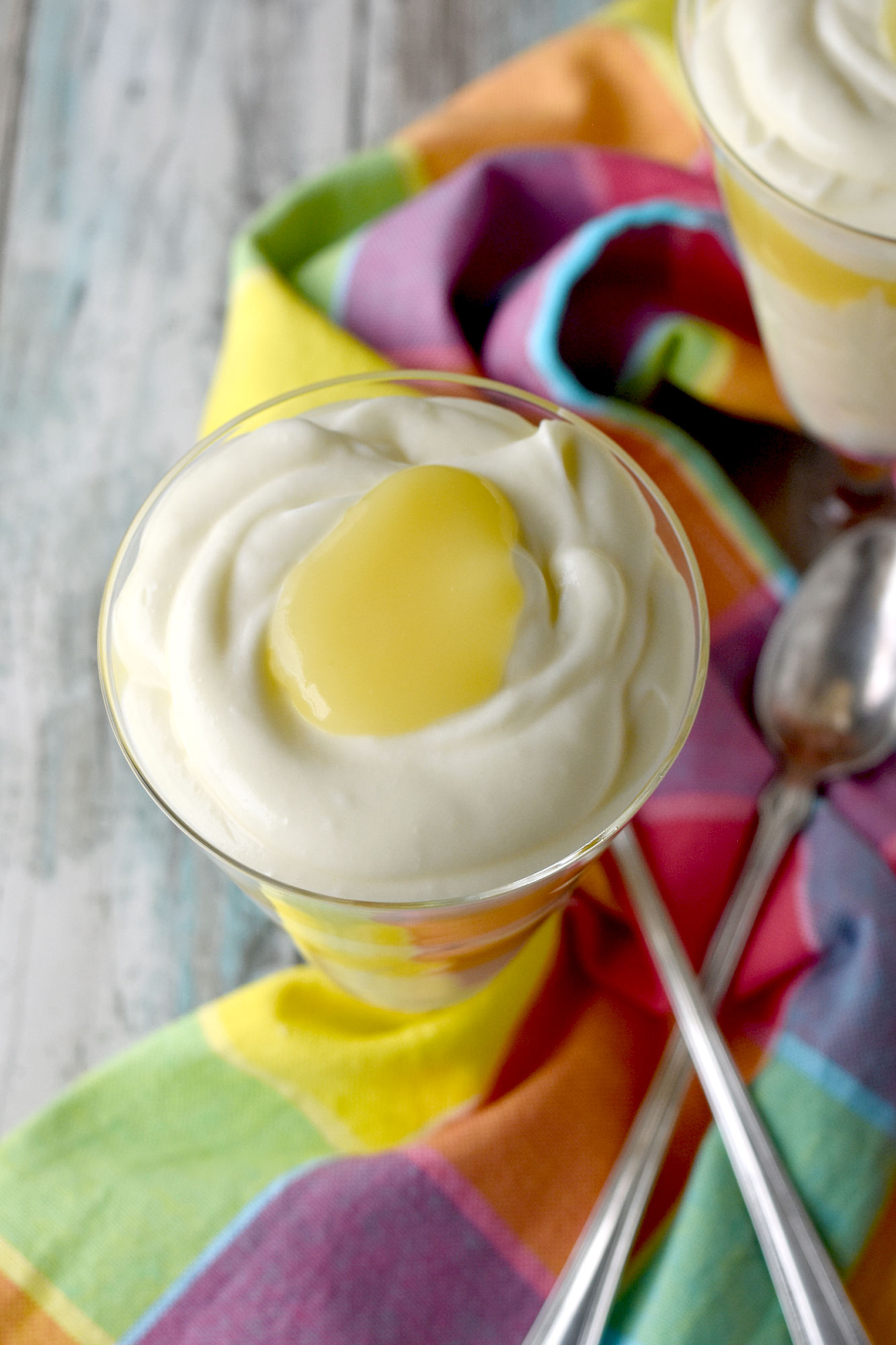 Key Lime Curd Mousse is creamy with a sweet and tangy flavor. I used leftover key lime curd, but you can easily make your own in the microwave. #BrunchWeek #keylimes #microwavecurd #dessert #easymousse
