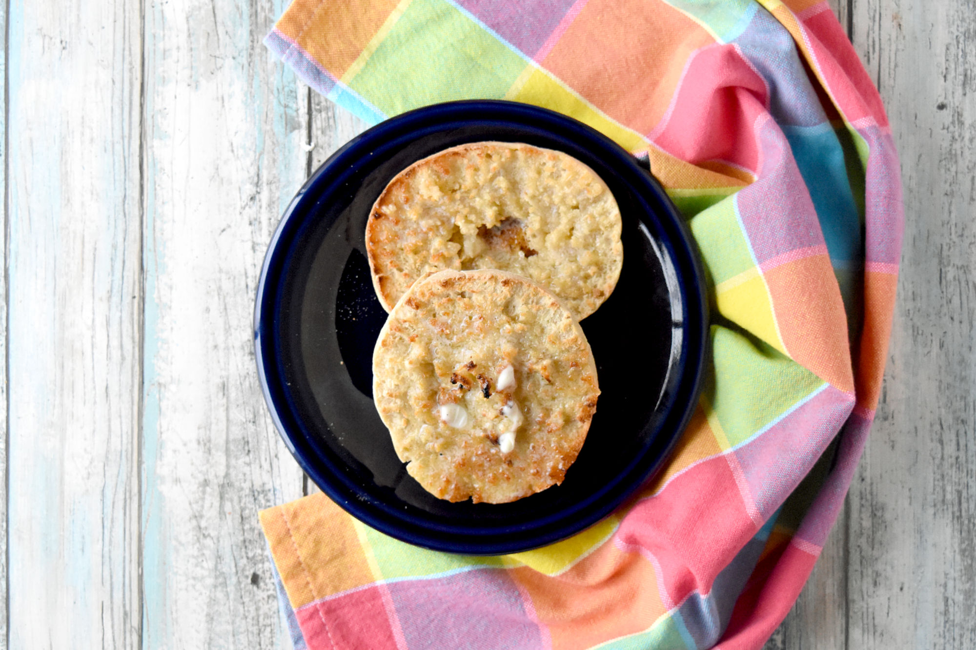 Sourdough English Muffins are easy to make and are a delicious change from your typical breakfast bread. They make the best muffin sandwiches, too! #BrunchWeek #sourdough #sourdoughstarter  #discaredrecipe #breadrecipe #Englishmuffins
