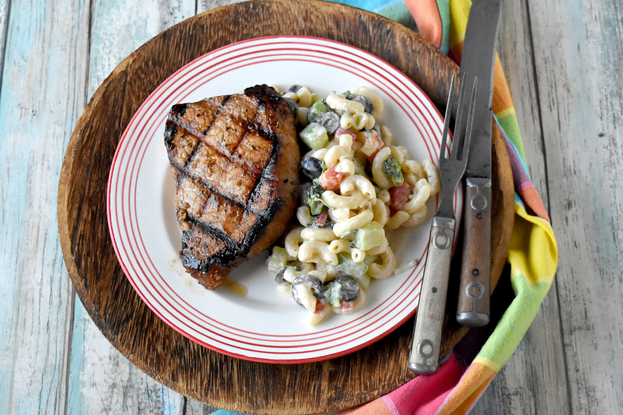 This truly is the Best Marinated Grilled Pork Chops. And the marinade has all pantry ingredients so you can easily whip it up any time you have some nice, thick pork chops. #BBWeek #marinatedchops #porkchops #thebestporkchops #bestmarinade
