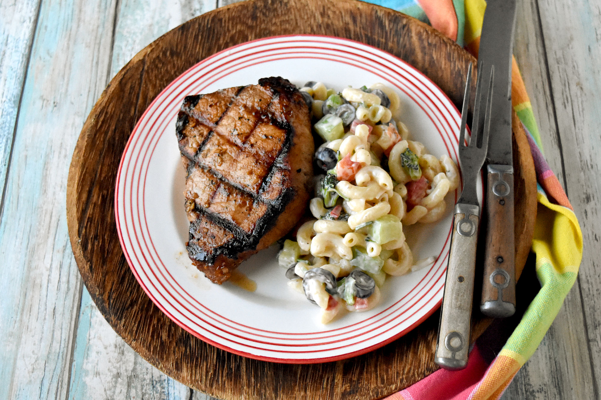 This truly is the Best Marinated Grilled Pork Chops. And the marinade has all pantry ingredients so you can easily whip it up any time you have some nice, thick pork chops. #BBWeek #marinatedchops #porkchops #thebestporkchops #bestmarinade
