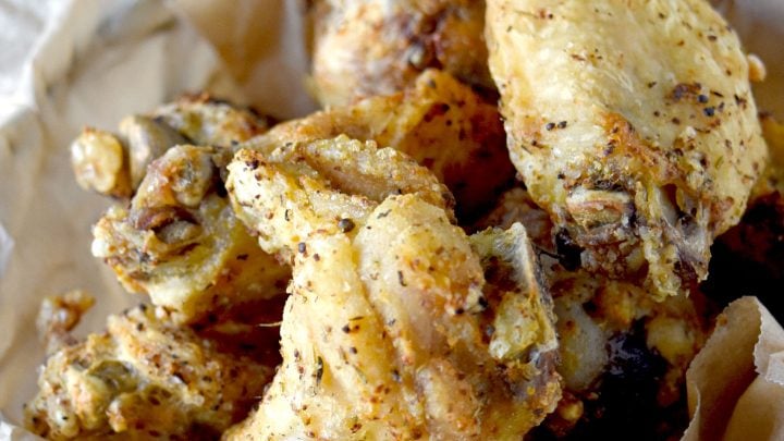 These are the Crispest Air Fryer Wings I’ve ever made. They have a crunchy outside and a juicy, tender inside. An easy and delicious snack for game day! #OurFamilyTable #airfryer #crispywings #crispyairfryerwings #chickenwings #chickenwinglover #gamedayfood