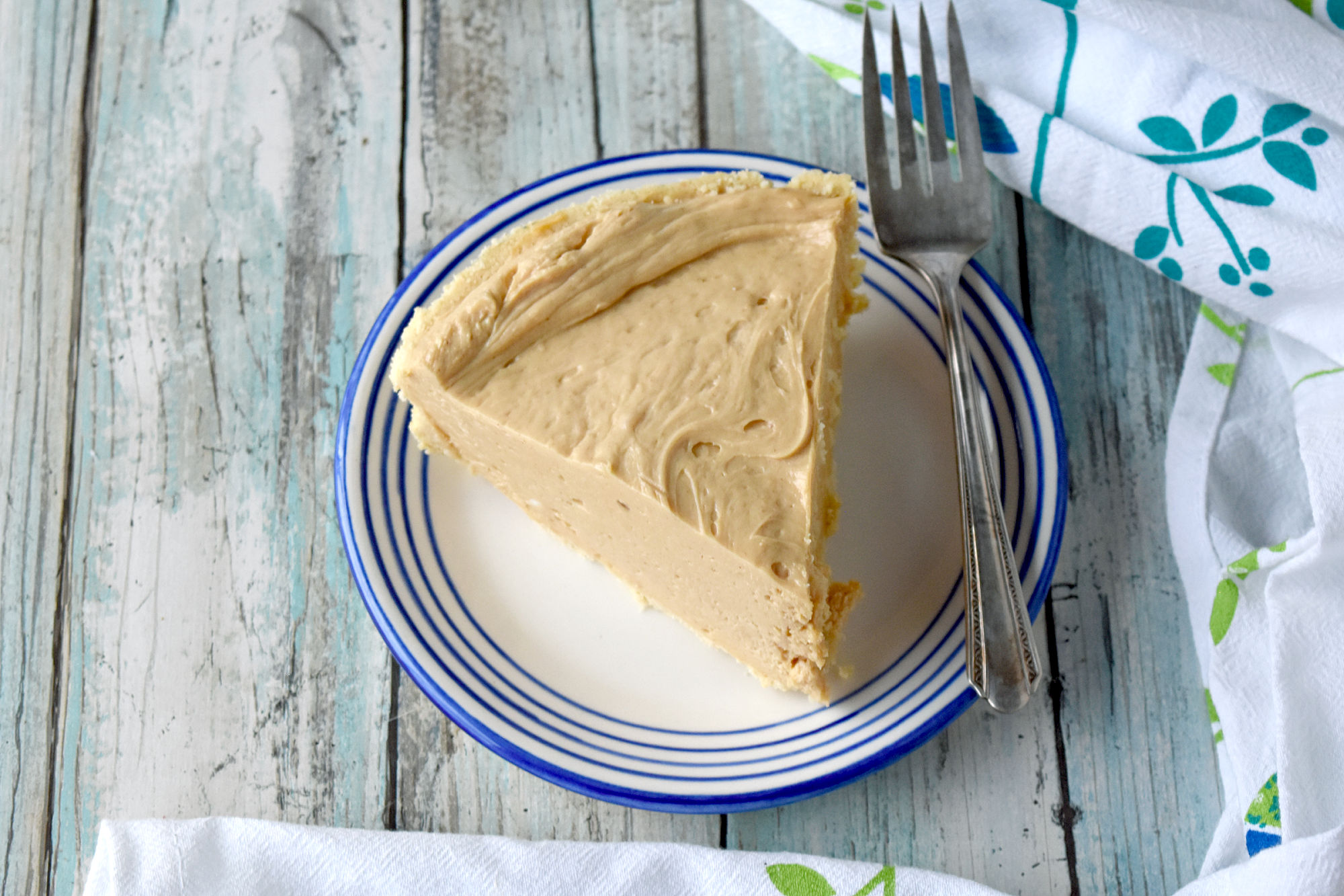 "Easy No Bake Peanut Butter Pie has 5 ingredients and whips up in under five minutes.  Perfect for a backyard party or barbecue.  Or just because you want some peanut butter pie.  #OurFamilyTable #peanutbutterpie #nobakepie #peanutbutter #nobakedessert