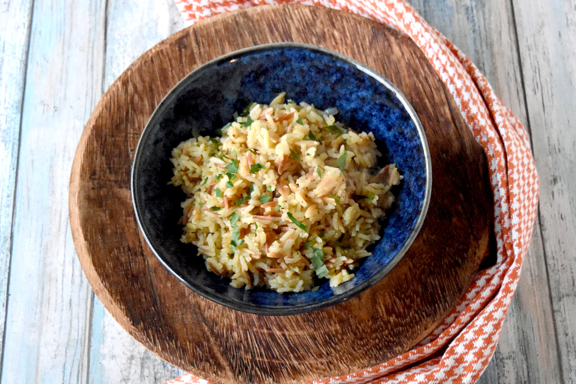 Skip the boxed mix and make Homemade Rice Pilaf at home. With some simple pantry ingredients, the sky, and your imagination, is the limit with all the ways you can customize this simple recipe. #ComfortFood #OurFamilyTable #ricepilaf #betterthanboxedrice #homemaderice #ricesidedish #HomeCooked #RicePilafLove
